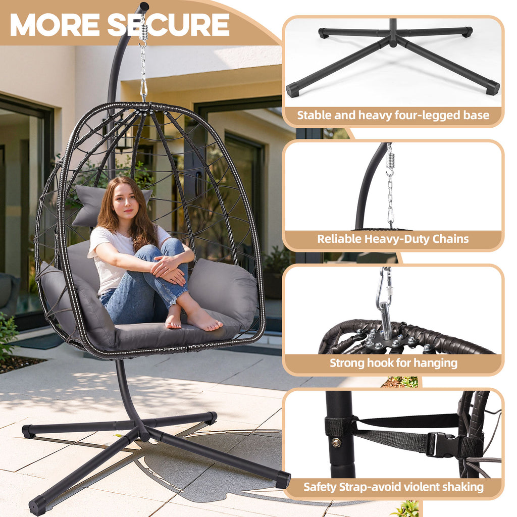 Hanging chair with stability features highlighted, including a stable base, heavy-duty chains, and safety strap.