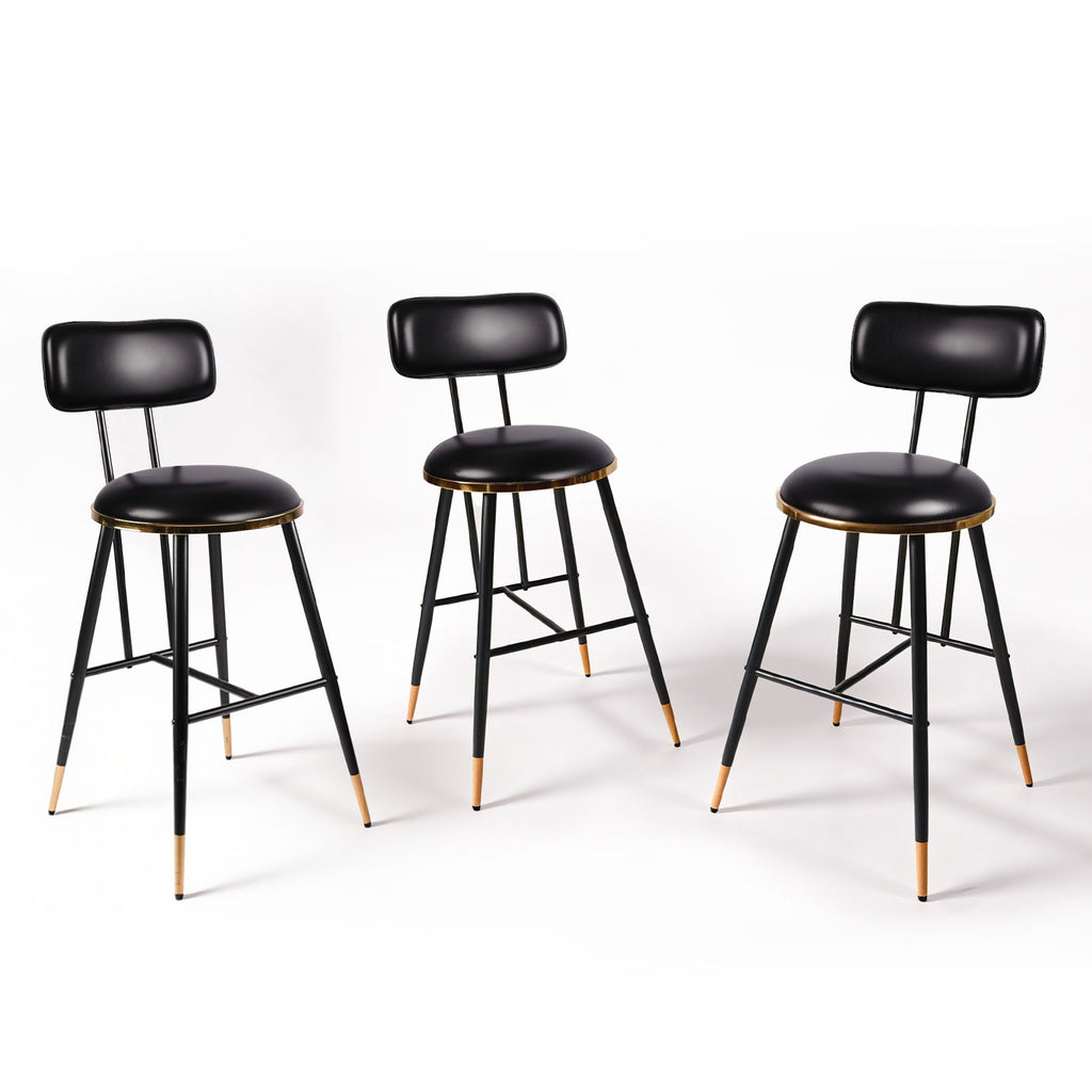 Three black bar stools with cushioned seats on a white background